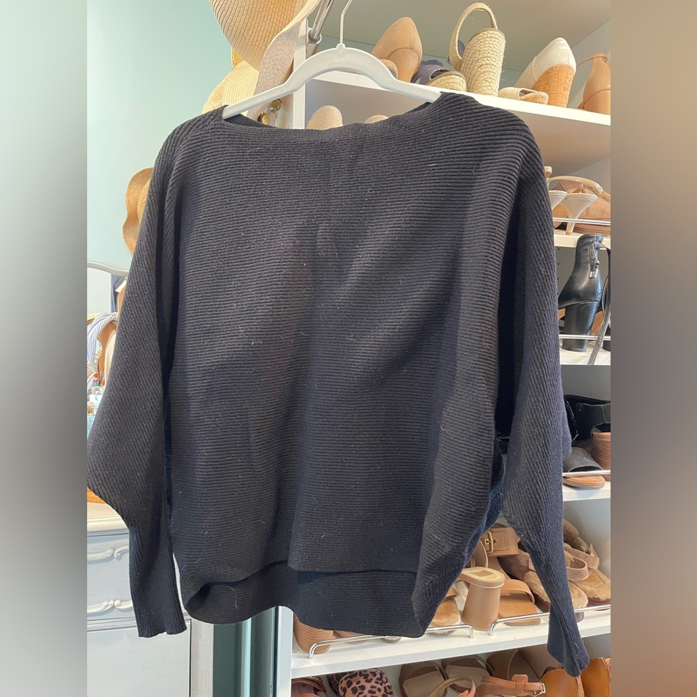 Black batwing sweater